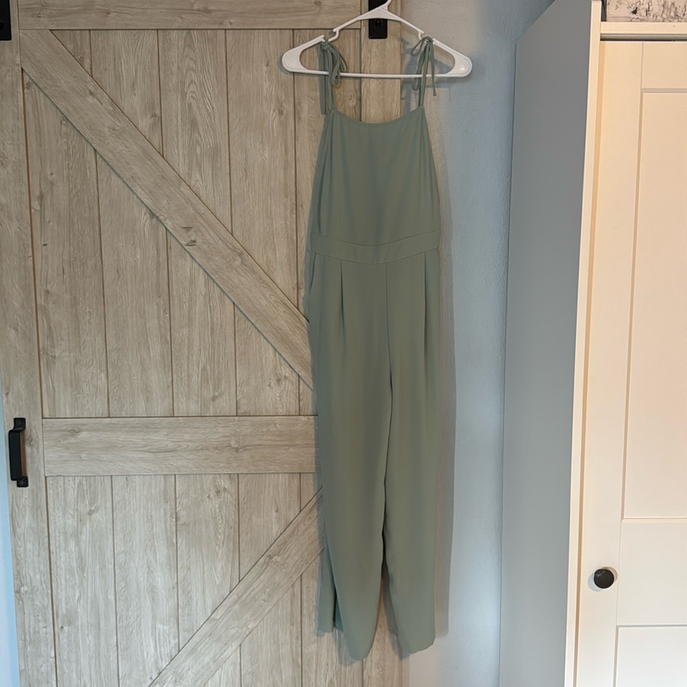 Line and dot size small mint green jumpsuit with pockets backless